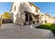 House exterior with backyard patio and side yard at 9823 E Escondido Ave, Mesa, AZ 85208