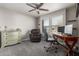 Bright home office featuring a comfortable chair and desk at 9823 E Escondido Ave, Mesa, AZ 85208