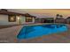 Inviting backyard oasis featuring a sparkling pool, ideal for relaxation and entertainment at 1123 N 60Th Dr, Phoenix, AZ 85043