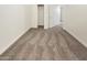 Bright bedroom with carpet and closet at 13033 W Avalon Dr, Avondale, AZ 85392