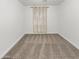 Simple bedroom with carpeted floor and window coverings at 13033 W Avalon Dr, Avondale, AZ 85392