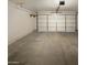 Spacious garage with automatic door opener at 13033 W Avalon Dr, Avondale, AZ 85392