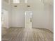 Spacious living room with high ceilings and tile floors at 13033 W Avalon Dr, Avondale, AZ 85392