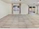 Spacious living area with sliding doors leading to the backyard at 13033 W Avalon Dr, Avondale, AZ 85392