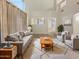 Spacious living room with ample natural light and comfy seating at 13033 W Avalon Dr, Avondale, AZ 85392