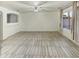 Large living room with tile flooring and lots of natural light at 13033 W Avalon Dr, Avondale, AZ 85392