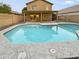 Large backyard pool with spacious patio area at 13033 W Avalon Dr, Avondale, AZ 85392