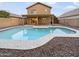 Inviting backyard oasis with a sparkling pool at 13033 W Avalon Dr, Avondale, AZ 85392
