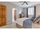 Comfortable bedroom with ceiling fan and wood dresser at 13600 N Fountain Hills Blvd # 604, Fountain Hills, AZ 85268