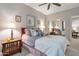Bedroom with wood nightstands and ceiling fan at 13600 N Fountain Hills Blvd # 604, Fountain Hills, AZ 85268