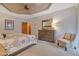 Comfortable bedroom with ensuite bathroom and dresser at 13600 N Fountain Hills Blvd # 604, Fountain Hills, AZ 85268