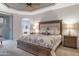 Spacious bedroom with king-size bed, wooden furniture and access to patio at 13600 N Fountain Hills Blvd # 604, Fountain Hills, AZ 85268