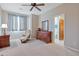 Spacious bedroom with ensuite bathroom access and a ceiling fan at 13600 N Fountain Hills Blvd # 604, Fountain Hills, AZ 85268