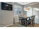 Kitchen dining area with table and chairs near window with shutters at 13600 N Fountain Hills Blvd # 604, Fountain Hills, AZ 85268