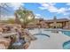 Resort-style pool, spa, and outdoor kitchen area at 13600 N Fountain Hills Blvd # 604, Fountain Hills, AZ 85268