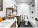 Clean bathroom with modern fixtures and a tub shower combo at 1720 W Sunnyslope Ln, Phoenix, AZ 85021