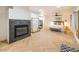 Main bedroom featuring fireplace and wood-look floors at 1720 W Sunnyslope Ln, Phoenix, AZ 85021