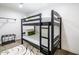 Bunk bed in a small bedroom, perfect for guests at 1720 W Sunnyslope Ln, Phoenix, AZ 85021
