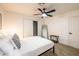 Spacious bedroom with ceiling fan and large closet at 1720 W Sunnyslope Ln, Phoenix, AZ 85021