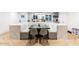 Eat-in kitchen with built-in bench seating and modern finishes at 1720 W Sunnyslope Ln, Phoenix, AZ 85021