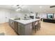 Modern kitchen with large island and stainless steel appliances at 1720 W Sunnyslope Ln, Phoenix, AZ 85021