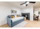 Cozy living area with daybed and built-in fireplace at 1720 W Sunnyslope Ln, Phoenix, AZ 85021