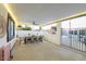 Covered patio with dining table and chairs, adjacent to the pool at 1720 W Sunnyslope Ln, Phoenix, AZ 85021