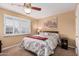 Serene bedroom with ceiling fan, window shutters, and calming decor at 18003 N 134Th Ave, Sun City West, AZ 85375