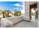 Covered front porch with a view of the neighborhood at 18609 W Onyx Ave, Waddell, AZ 85355