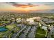 Aerial view of community with lake, clubhouse, and amenities at 20571 N Lemon Drop Dr, Maricopa, AZ 85138