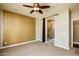 Bedroom with neutral walls, carpeting and ceiling fan at 20571 N Lemon Drop Dr, Maricopa, AZ 85138