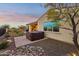 Private backyard with hot tub and rock landscaping at 2317 N Beverly Pl, Buckeye, AZ 85396