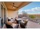 Relaxing backyard oasis with a fire pit, hot tub, and putting green at 2317 N Beverly Pl, Buckeye, AZ 85396