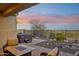 Serene backyard oasis with hot tub and beautiful sunset views at 2317 N Beverly Pl, Buckeye, AZ 85396