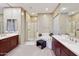 Elegant bathroom with double vanity, large shower, and soaking tub at 2317 N Beverly Pl, Buckeye, AZ 85396