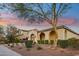 Charming home exterior with brick pathway and landscaping at 2317 N Beverly Pl, Buckeye, AZ 85396