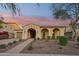 Beautiful home exterior with brick driveway and landscaping at 2317 N Beverly Pl, Buckeye, AZ 85396