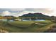 Scenic golf course view with lake and mountain backdrop at 2317 N Beverly Pl, Buckeye, AZ 85396