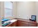 Bright home office with built-in desk and cabinets at 2317 N Beverly Pl, Buckeye, AZ 85396