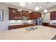 Spacious kitchen with granite countertops and stainless steel appliances at 2317 N Beverly Pl, Buckeye, AZ 85396