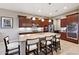 Gourmet kitchen with island, stainless steel appliances, and granite countertops at 2317 N Beverly Pl, Buckeye, AZ 85396