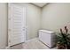 Storage room with chest freezer and exterior access at 2317 N Beverly Pl, Buckeye, AZ 85396