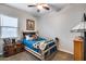 Cozy bedroom with rustic wooden bed and western decor at 24280 N 164Th Dr, Surprise, AZ 85387