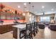 Island kitchen with stainless steel appliances and pendant lighting at 24280 N 164Th Dr, Surprise, AZ 85387