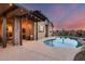 Covered patio with comfortable seating and sunset views at 24280 N 164Th Dr, Surprise, AZ 85387