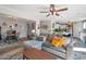 Spacious living room with comfortable sectional sofa and large TV at 307 E Impala Ct, Casa Grande, AZ 85122