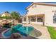 Relaxing kidney-shaped pool with a large patio area at 3143 E Morenci Rd, San Tan Valley, AZ 85143