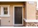 Close-up of a dark brown front door with a keypad at 4095 E Jasper Dr, Gilbert, AZ 85296