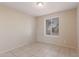 Bright bedroom with tile flooring and window at 4201 W Christy Dr, Phoenix, AZ 85029