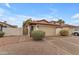 Cute stucco home with a 1-car garage and nicely landscaped front yard at 4337 E Corral St, Phoenix, AZ 85044